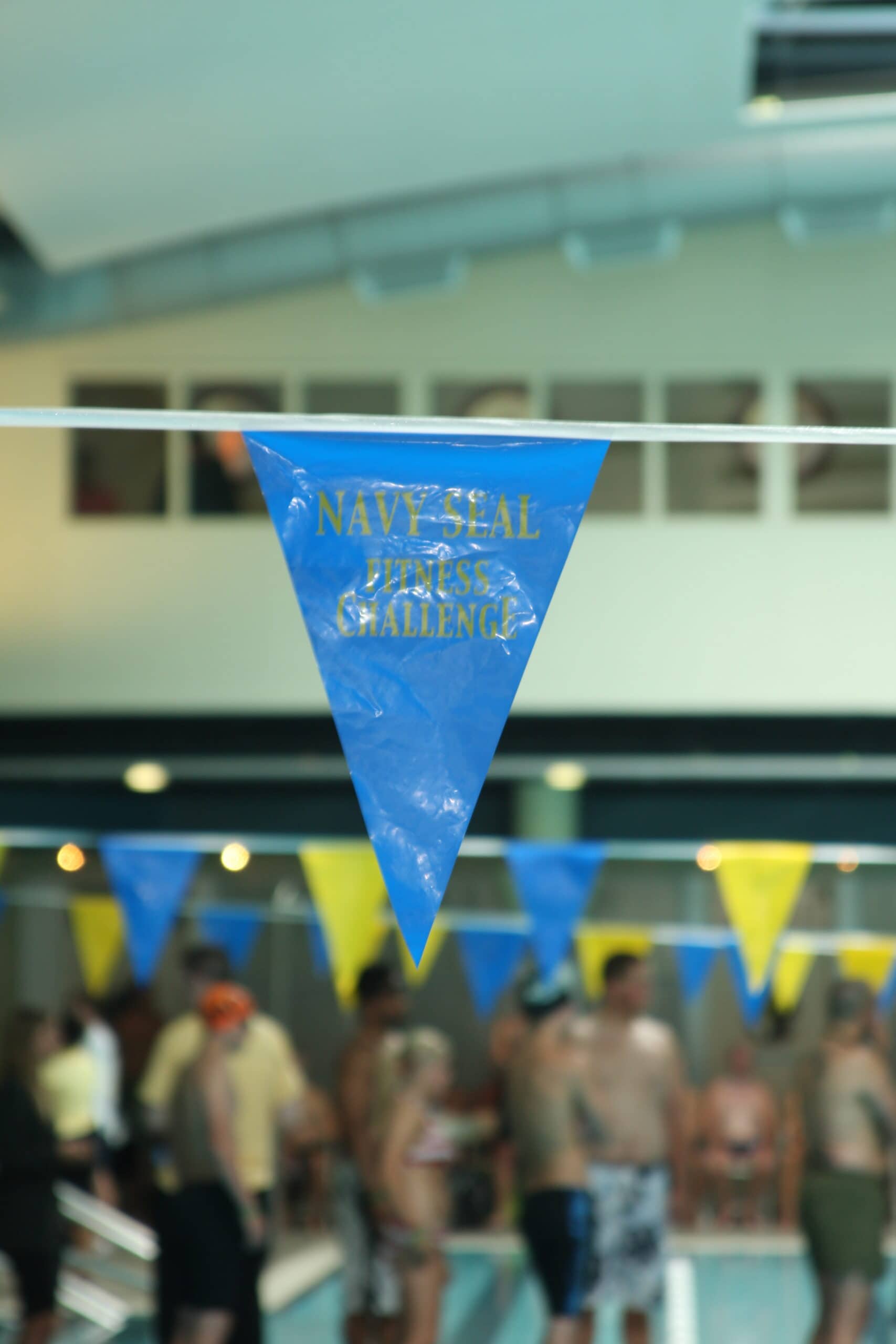 a flag hanging at an indoor swimming on-site activation event