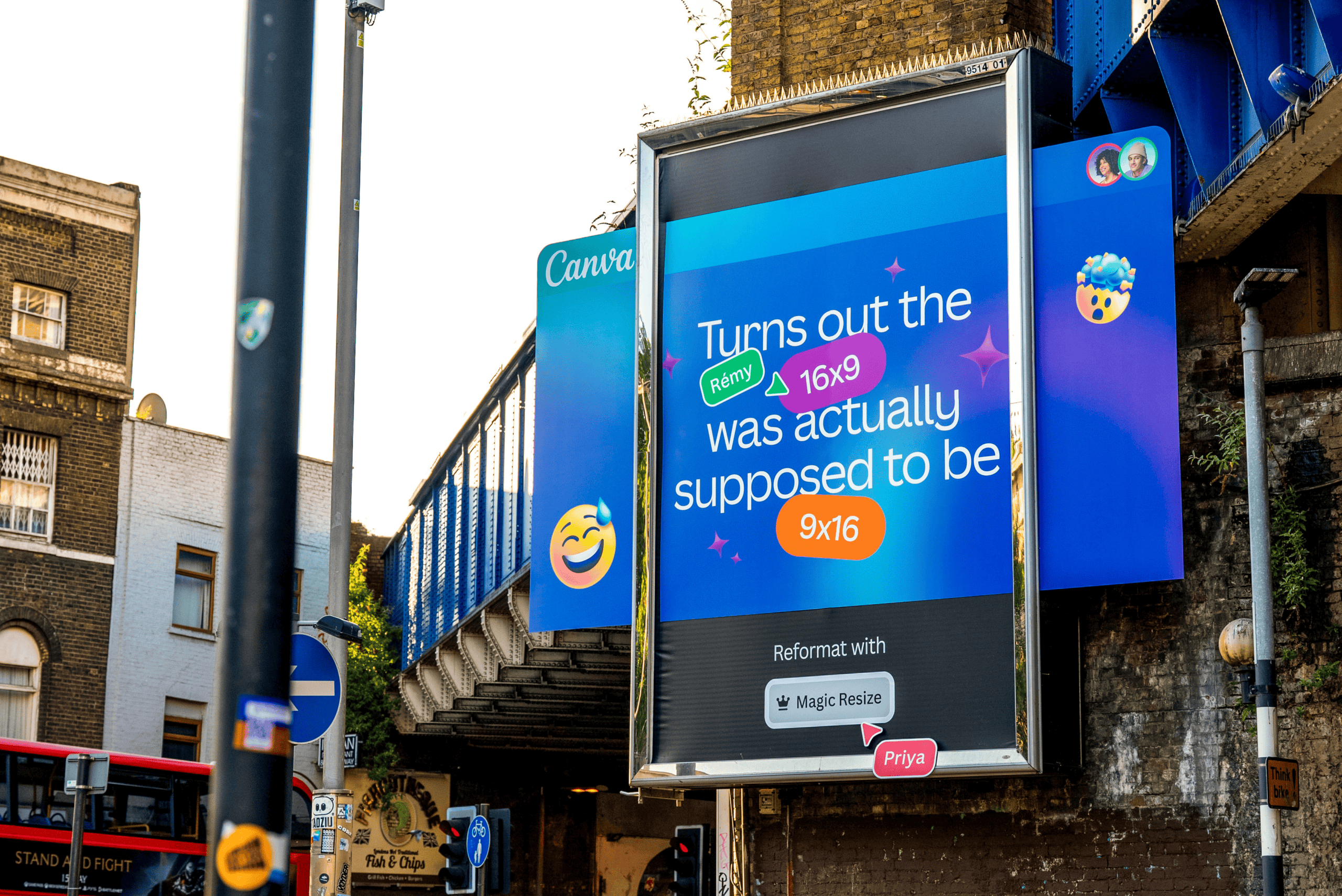 Large outdoor Canva billboard advertisement under a bridge featuring colorful graphics and text promoting the Magic Resize tool in an urban street setting.