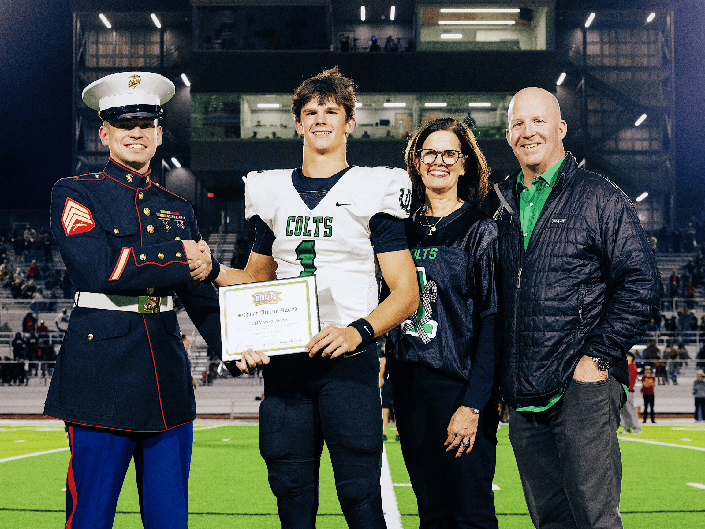 Scholar Athlete with family and marine